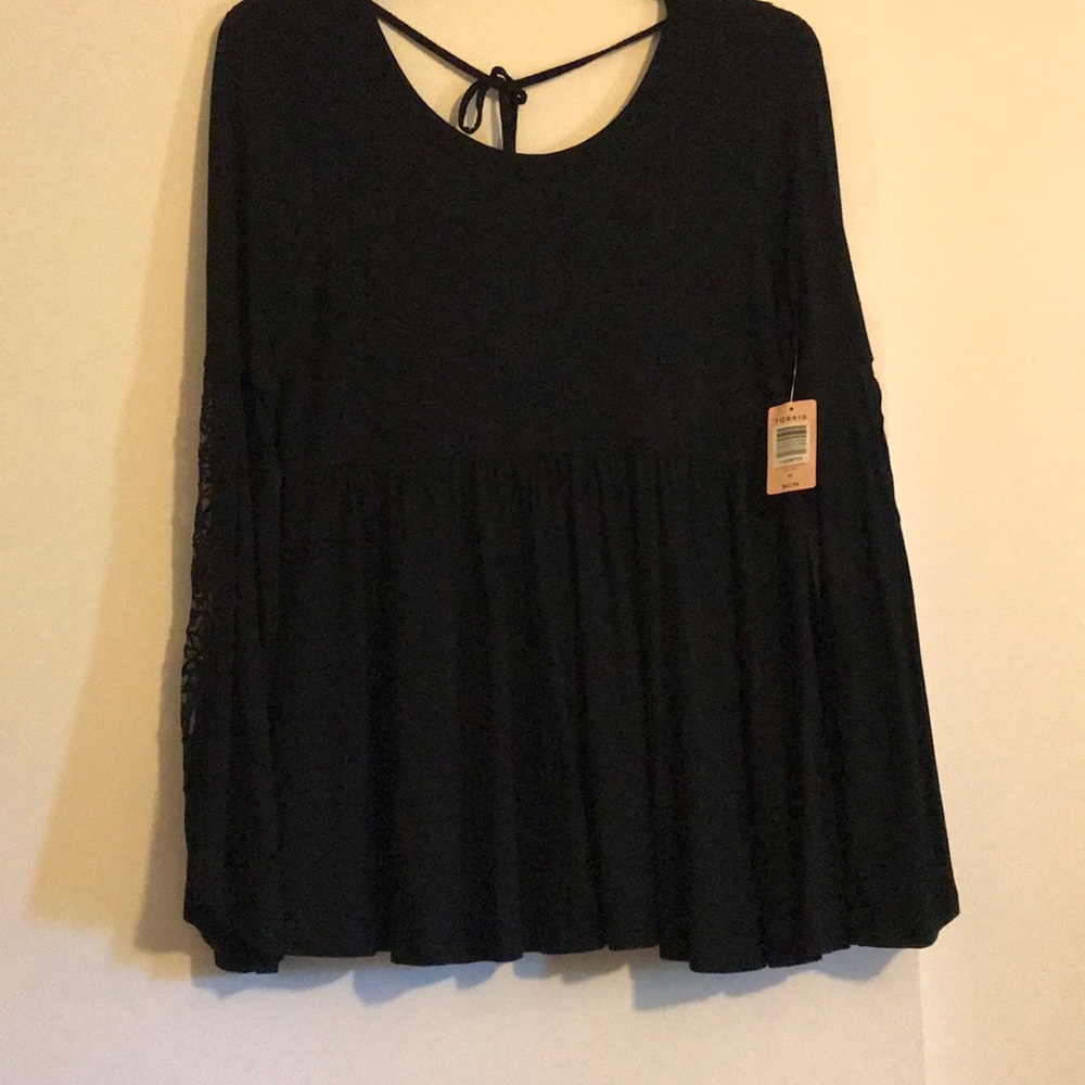 Black blouse with flowered sheer sleeve detail